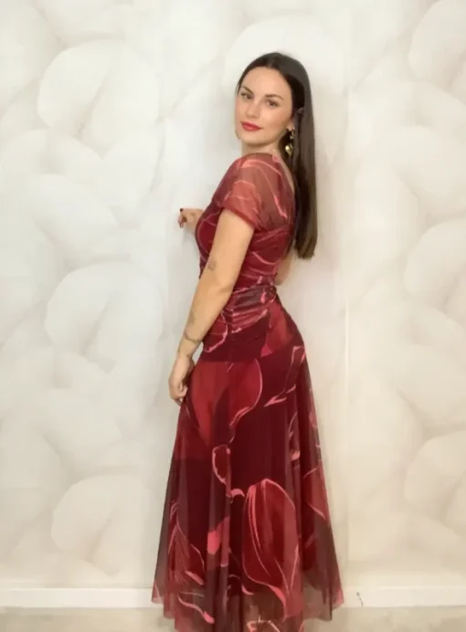 Vestido drapeado estampado.